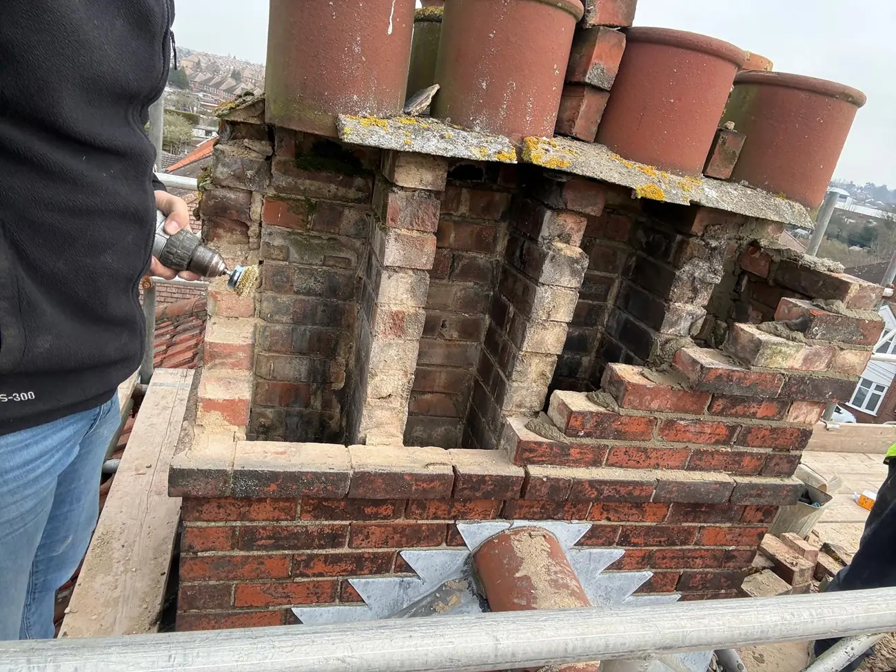 Chimney stack taken down to a safe course with a new lead tray being set, Ipswich