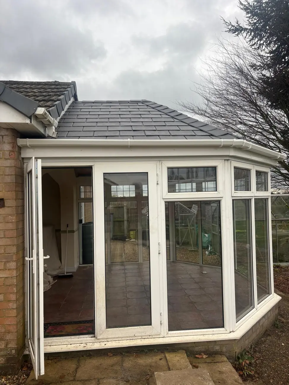 Finished composite slate conservatory roof in Walsoken, Wisbech seen from the patio