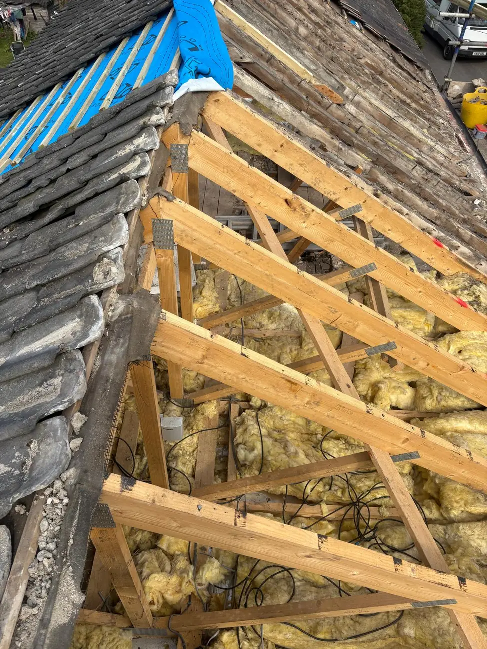 Insulation between new rafters before the clay pantiles go back on, Suffolk