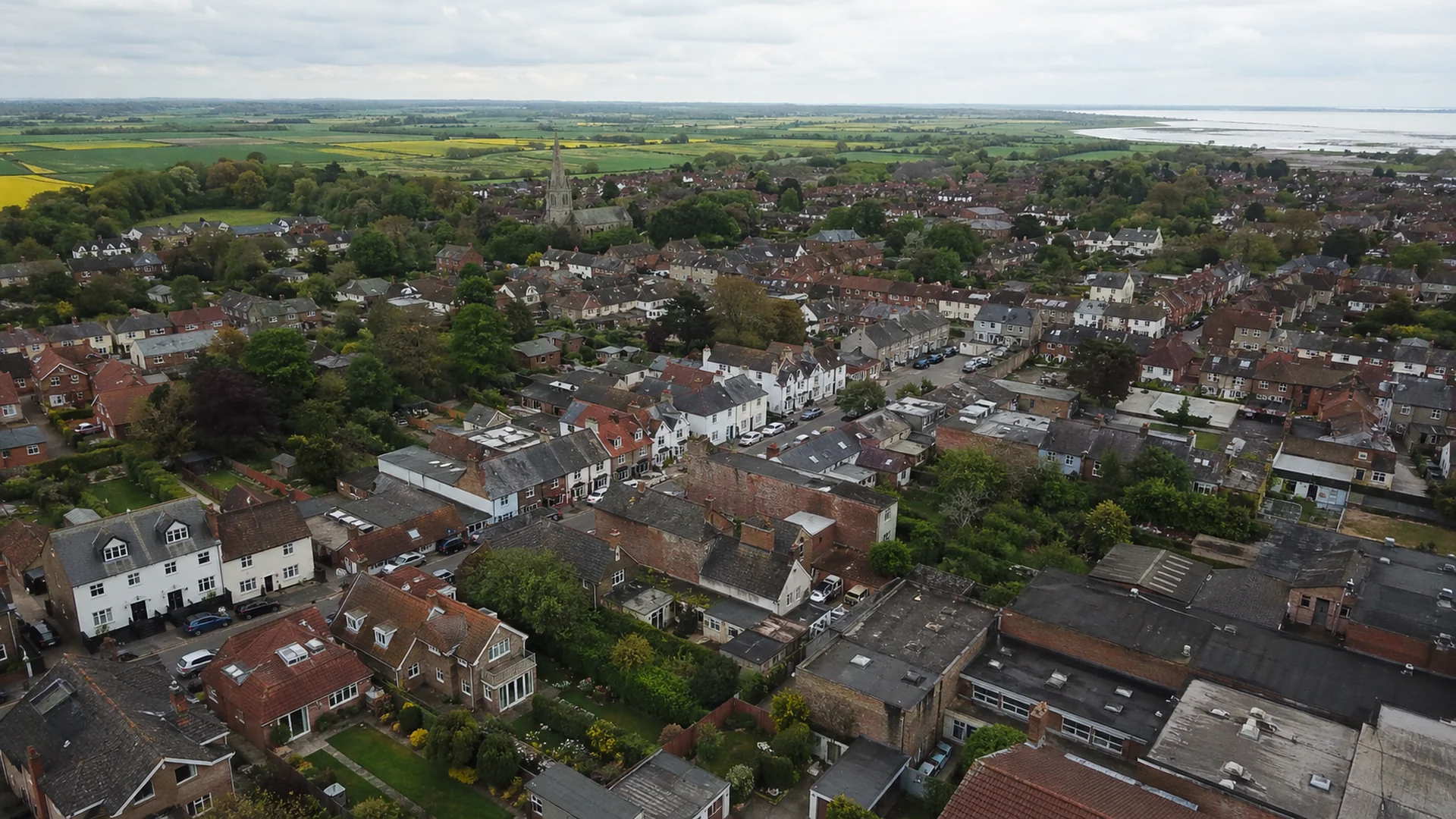 Aerial view of an East Anglia town's roofs, Stormproof Roofing coverage area