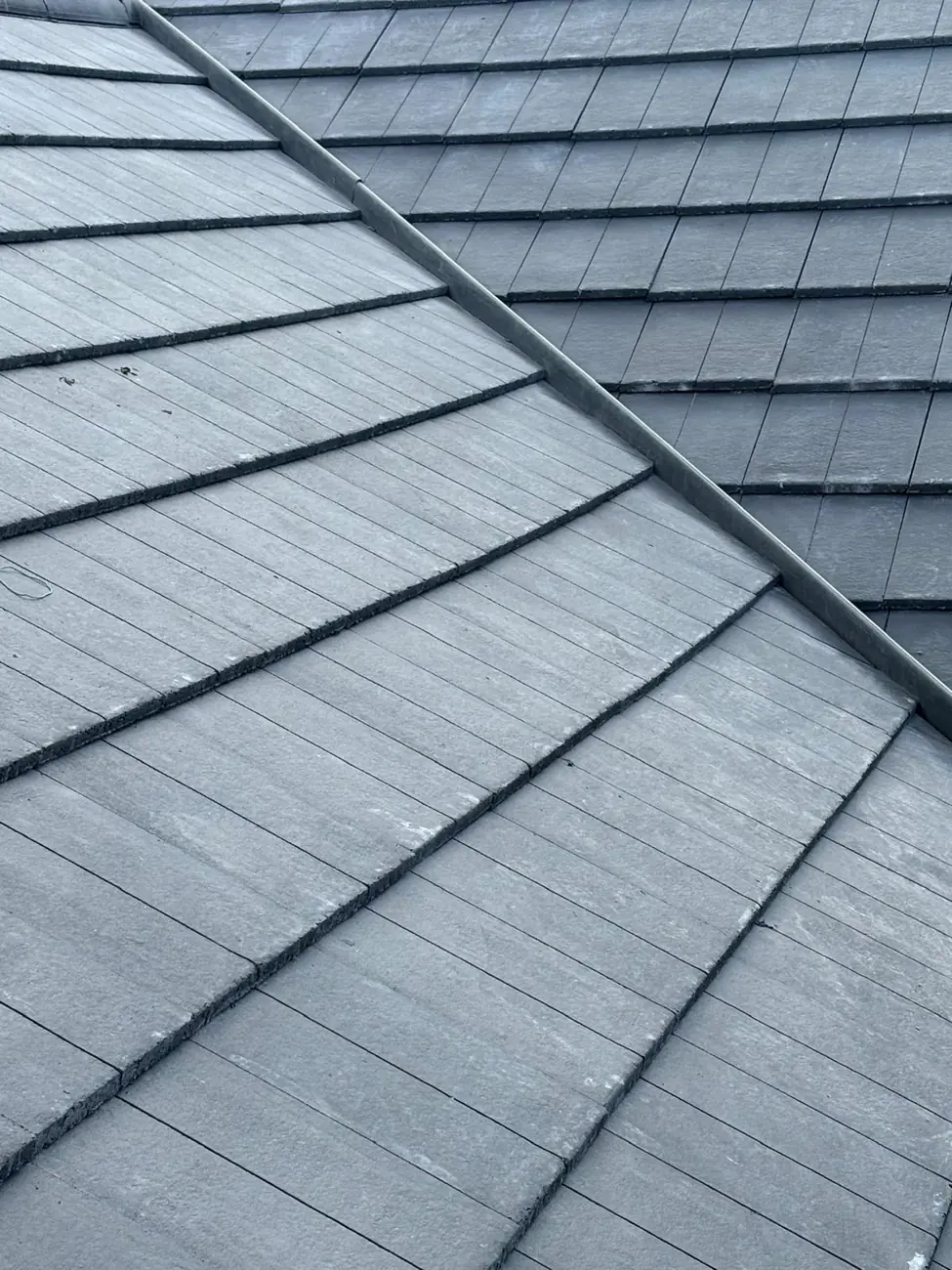 Valley detail on a completed tiled re-roof in Diss