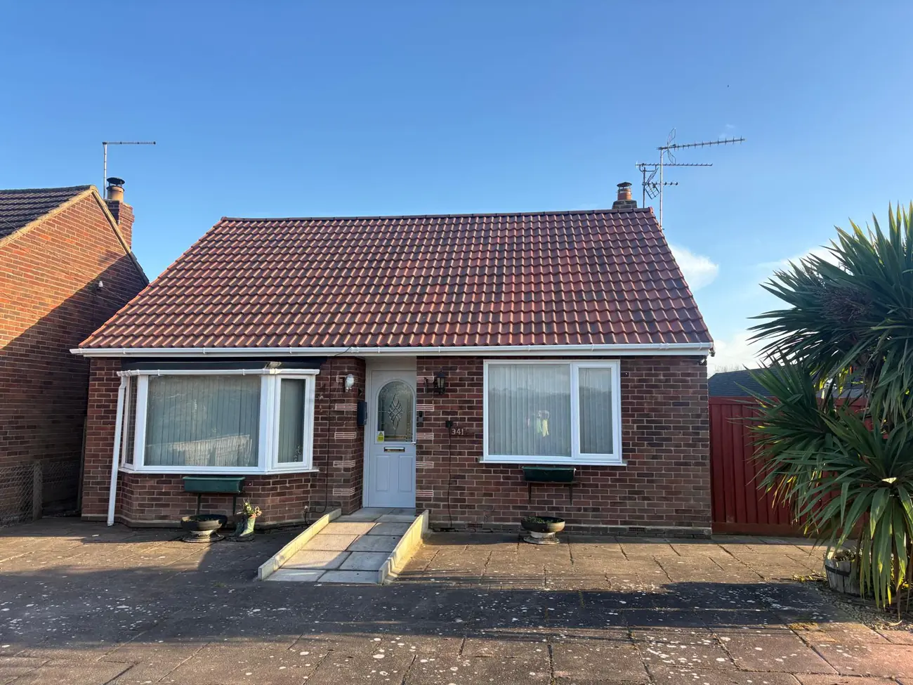 Finished tiled roof on a bungalow in Ipswich by Stormproof Roofing