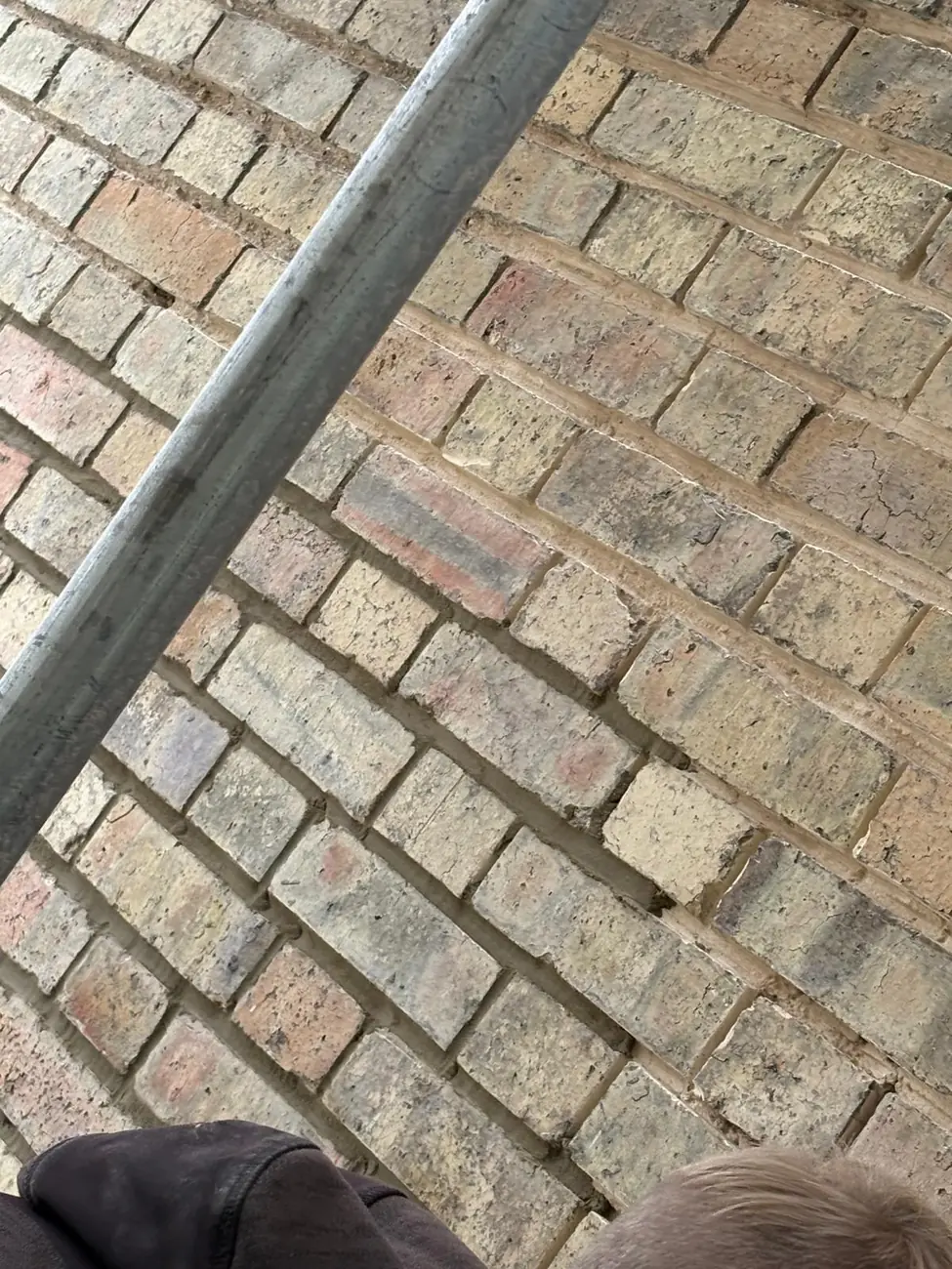 Completed repointing to a period brick wall in Woodbridge, Suffolk