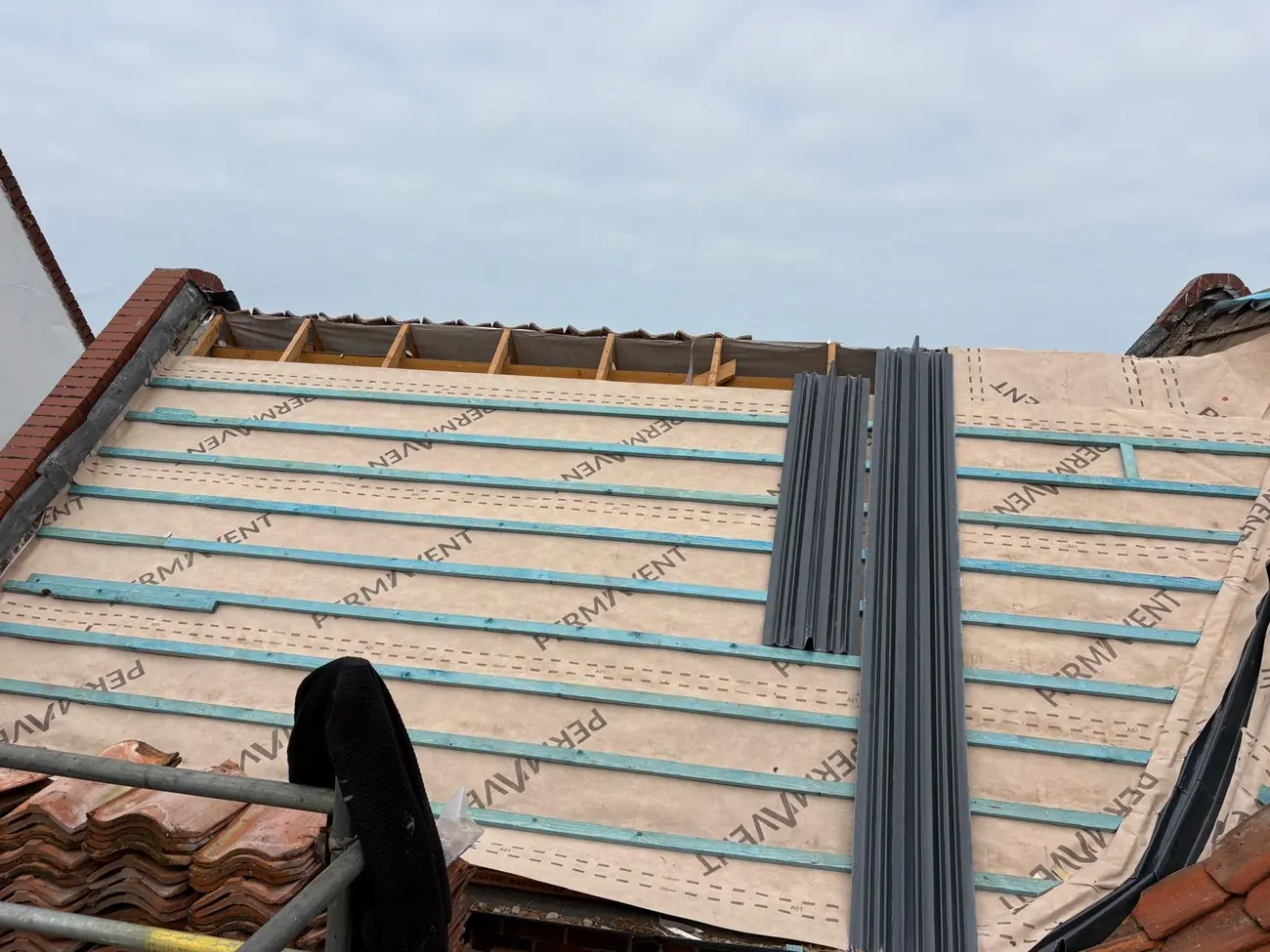 Battens gauged and a new valley set out on a Sheringham seafront re-roof