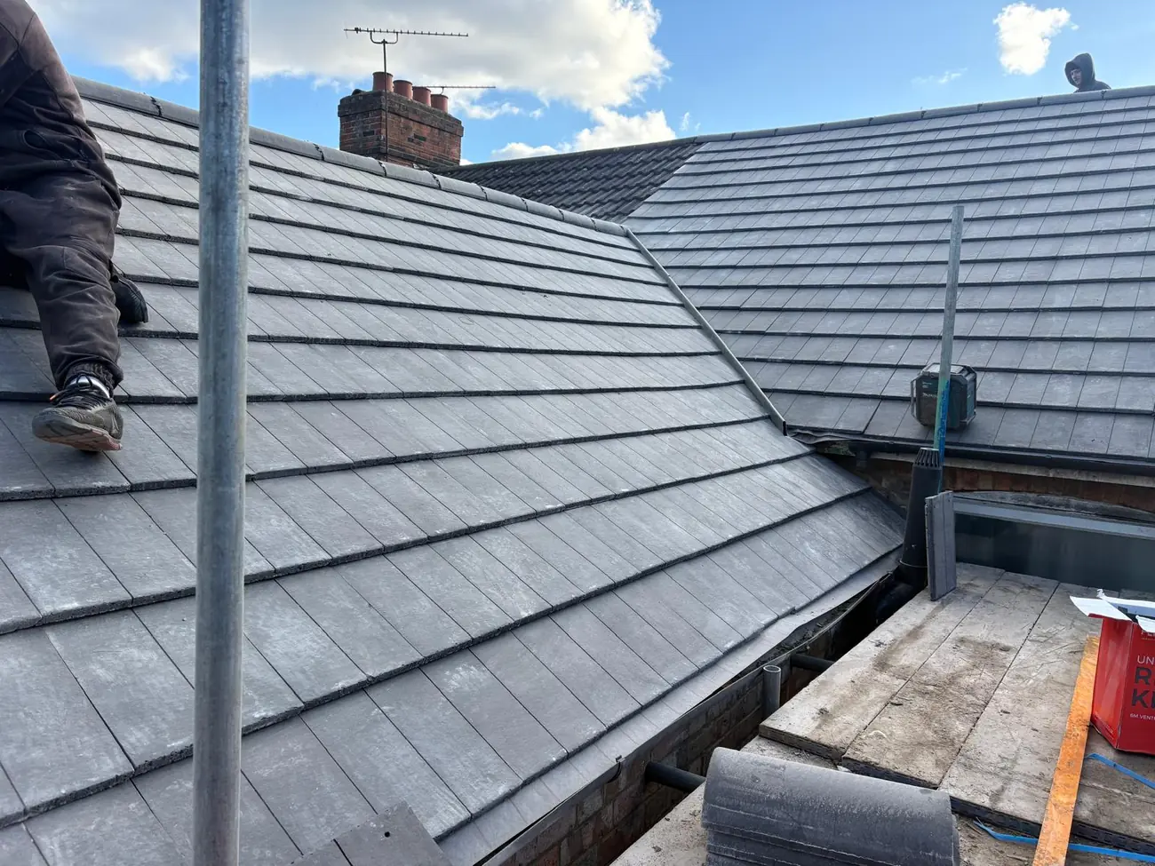 Stormproof roofer on a newly laid tiled roof in Diss
